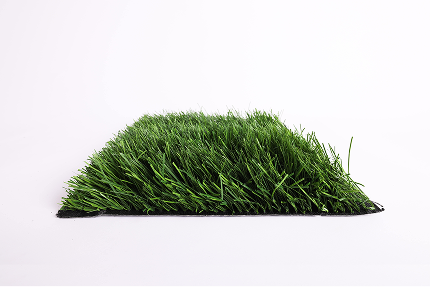 Square patch of thick artificial green grass on a white background.
