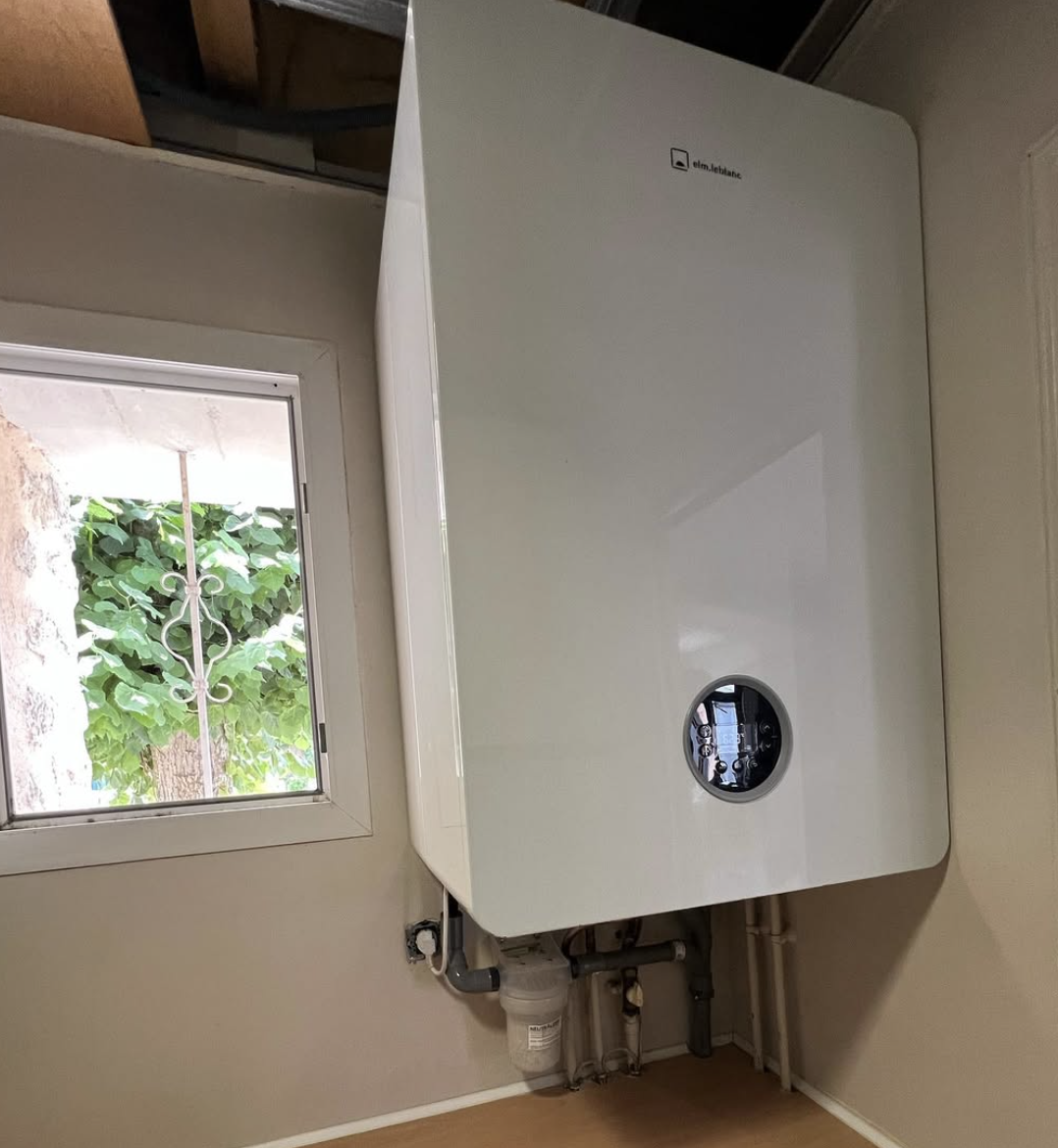 image of a high-efficiency water heater being inspected