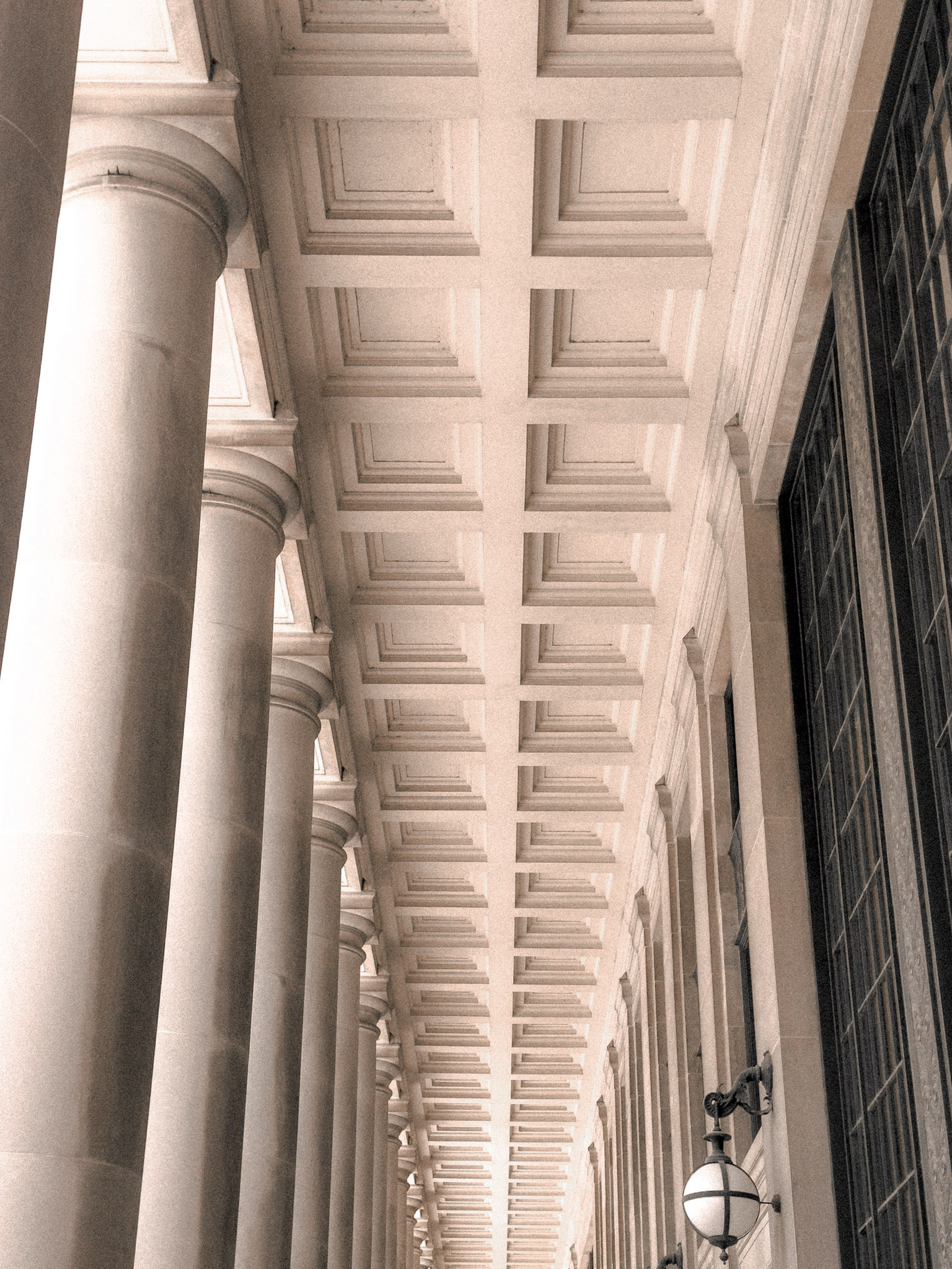 Classical colonnade with tall stone columns