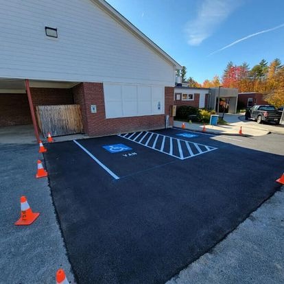 ADA-Compliant Handicap Parking Space in Newly Paved Lot