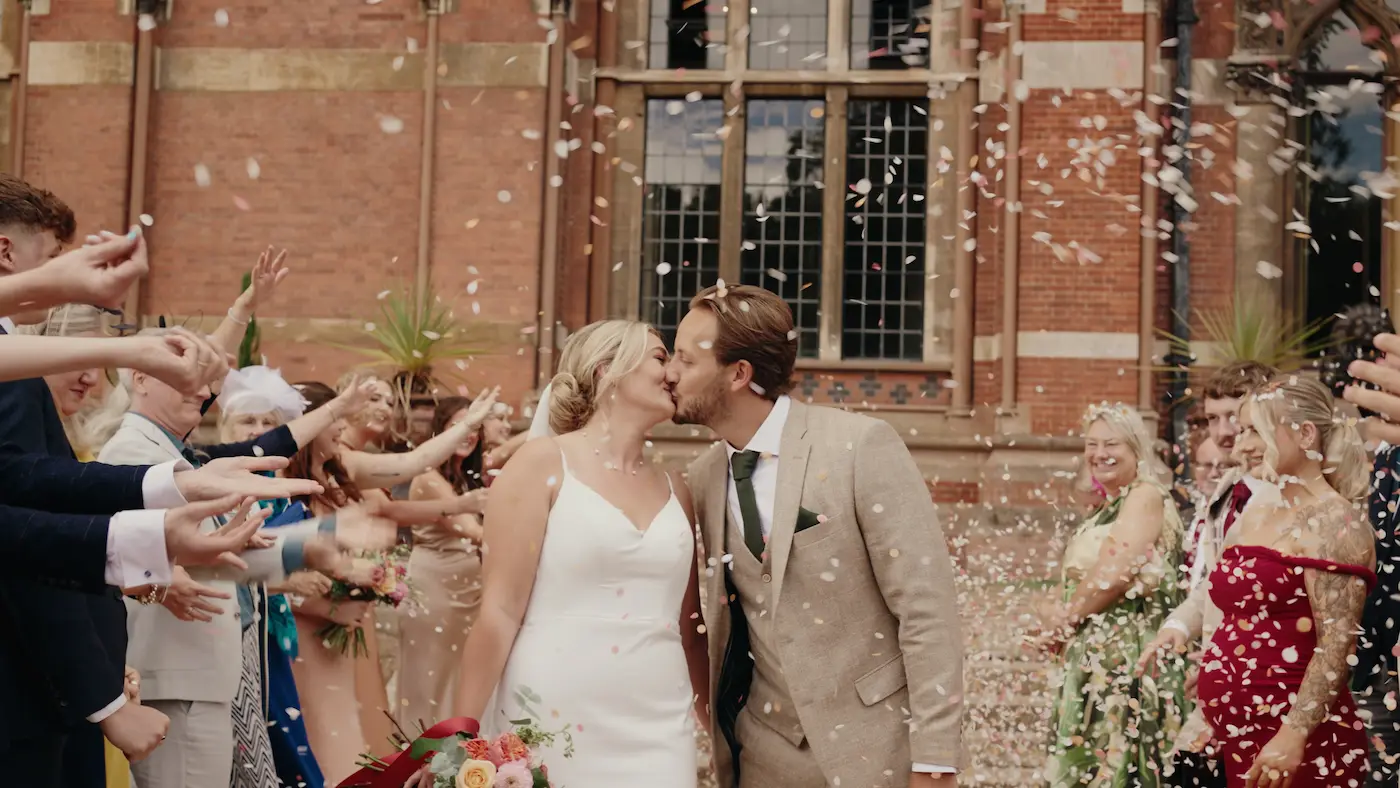 jake and amy confetti shot outside the reinassance at kelham hall