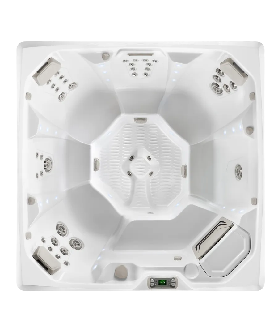 Weißer Whirlpool mit Düsen und Sitzgelegenheiten von oben