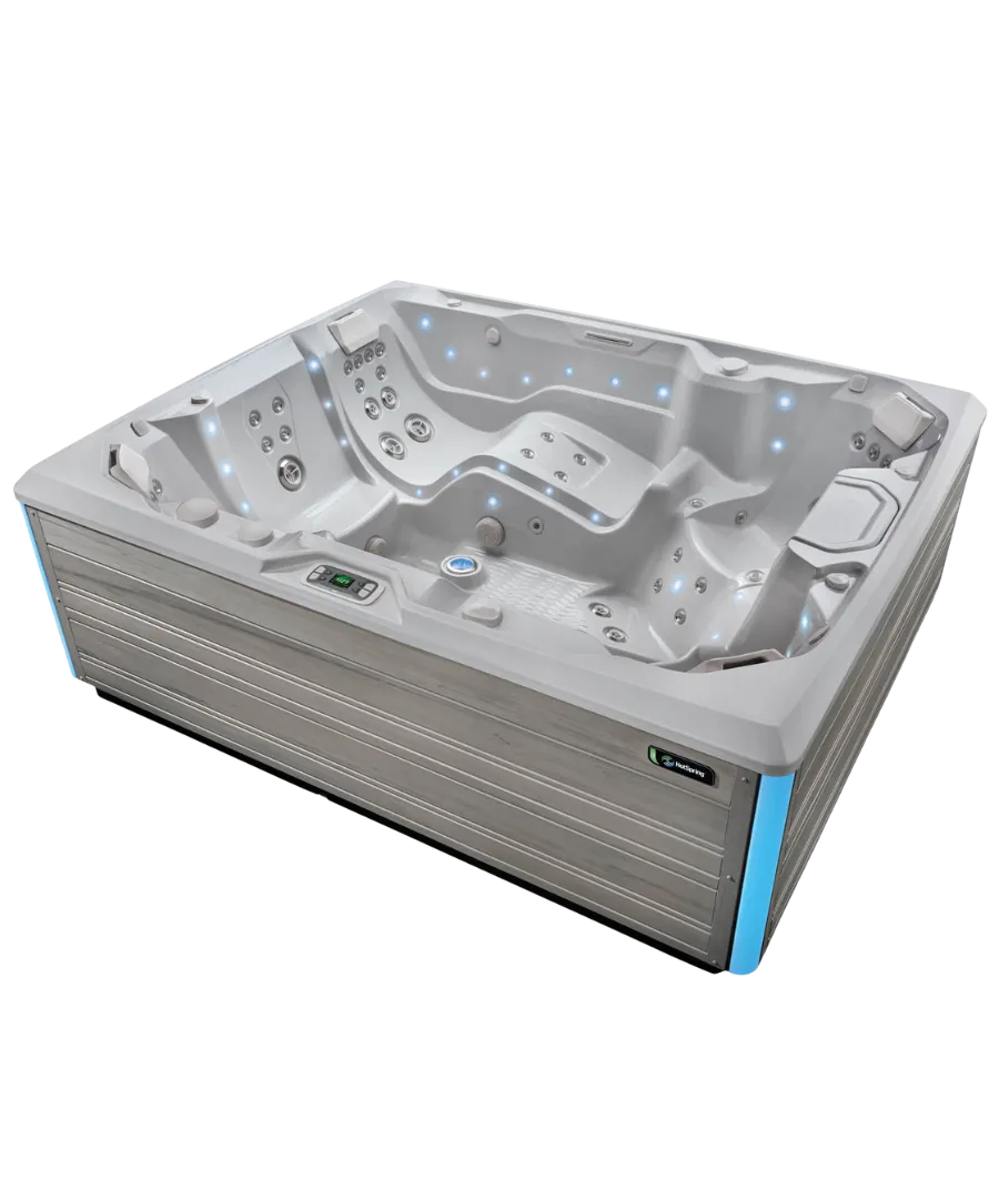 Moderner grauer Whirlpool mit blauen Akzenten und integrierten Beleuchtungen