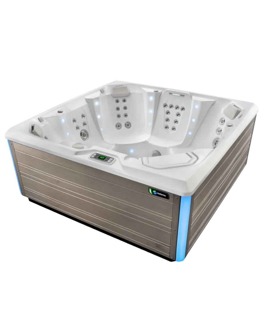 Weißer Whirlpool mit blauen Akzenten und mehreren Massagedüsen