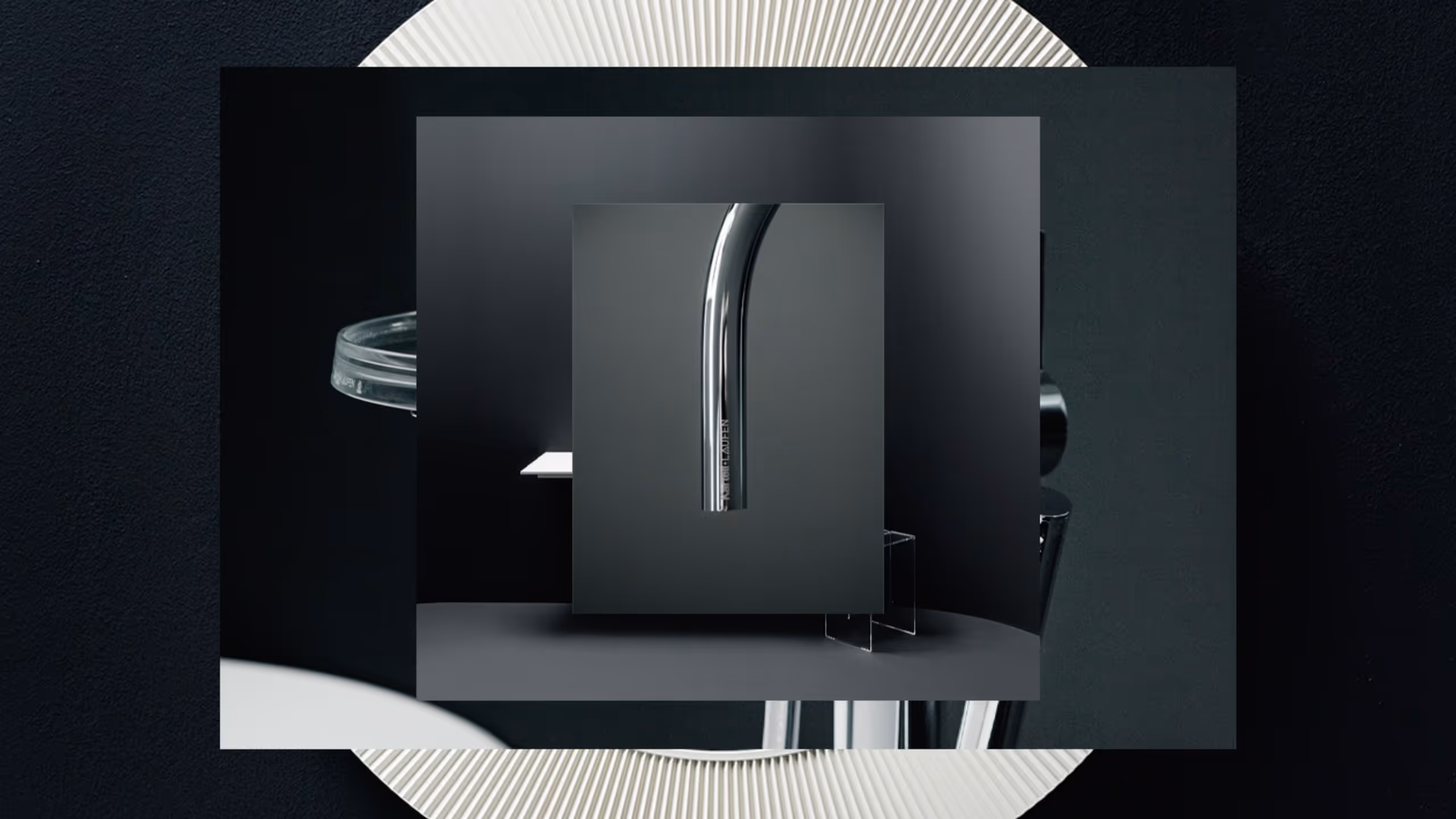 Close-up of a sleek, curved chrome faucet against a dark, minimalistic background.