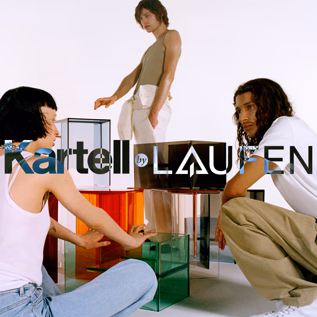 Three young people interacting with colorful transparent cube furniture pieces against a white background with 'Kartell by Laufen' text overlay.