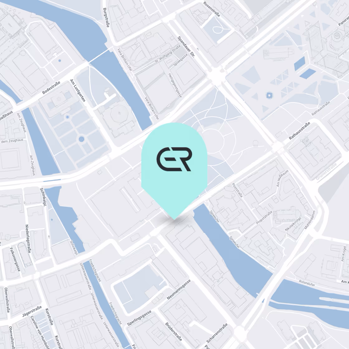 Map showing city streets and waterways with a prominent light blue location marker featuring a stylized 'ER' logo at the center.