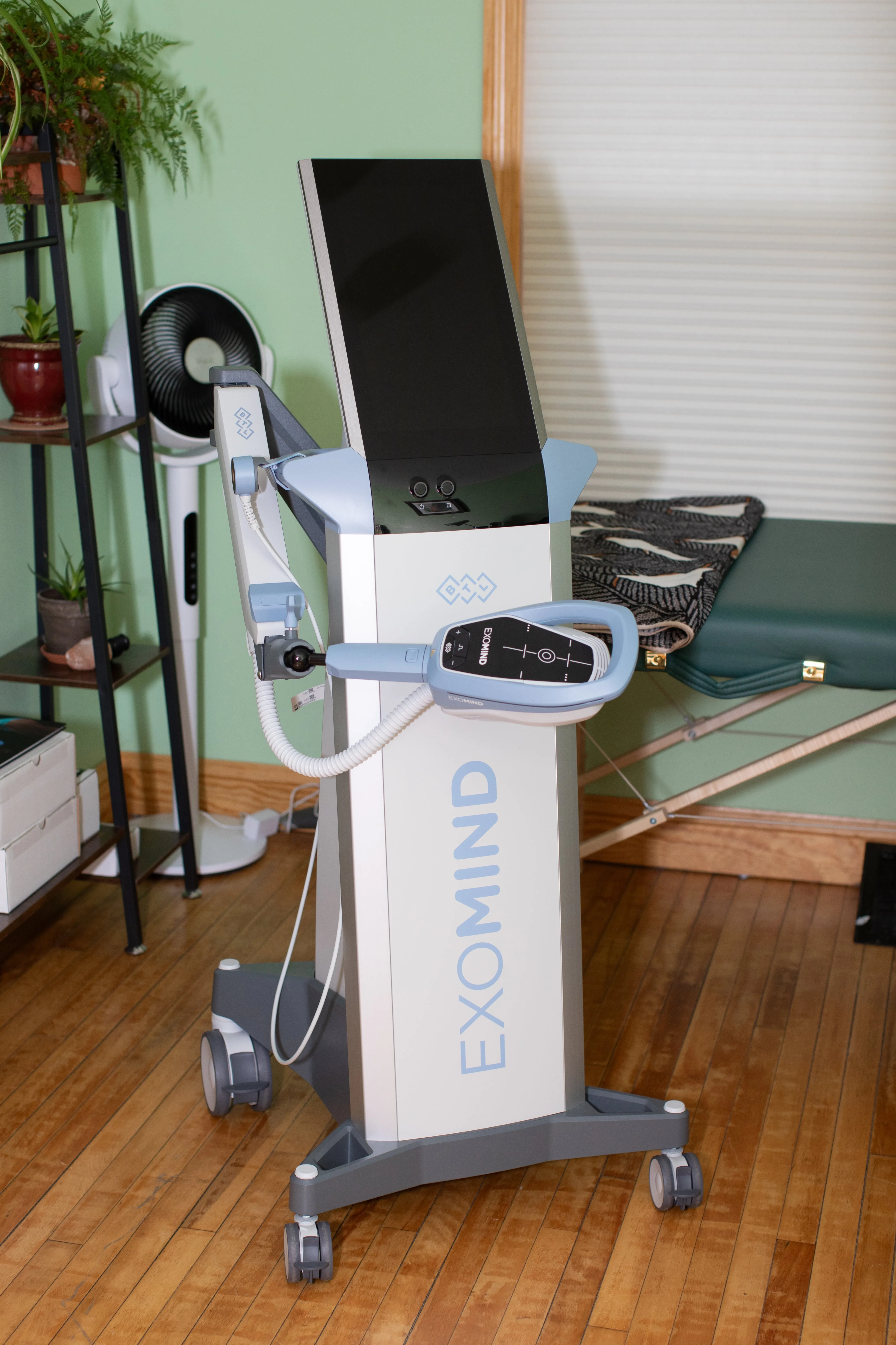 Exomind transcranial magnetic stimulation device used for mental health and wellness treatments