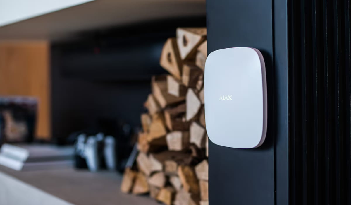 Ajax security system sensor transmitting an alarm signal to the hub using encrypted wireless communication