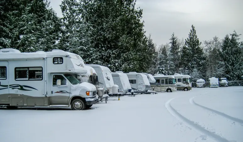 somr RV's covered with snow