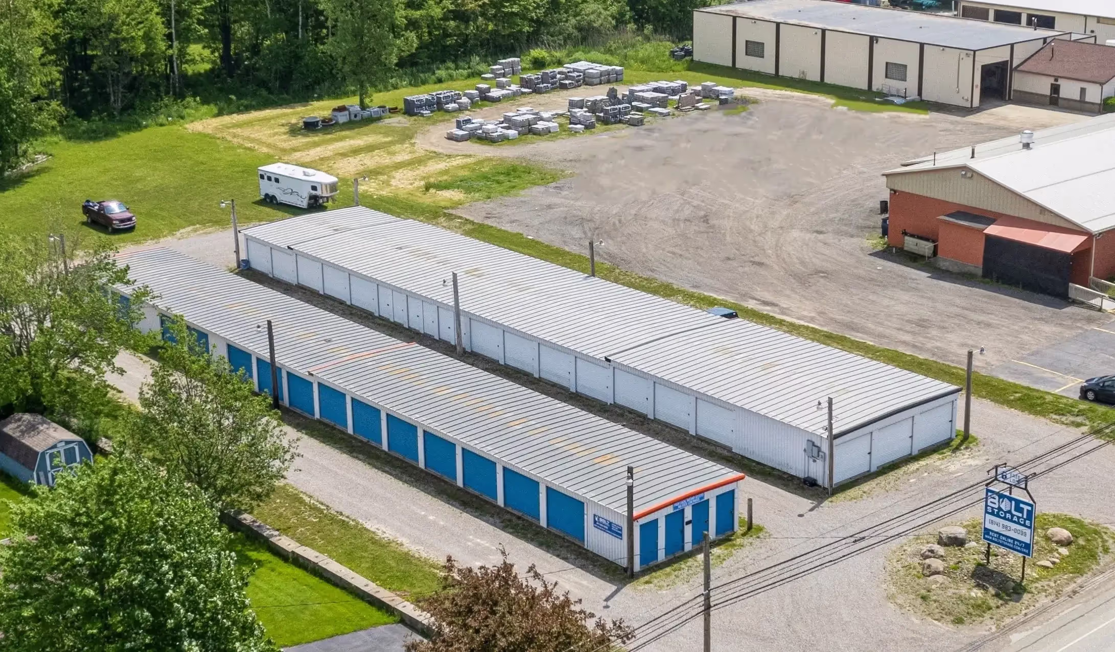 Aerial view of the Erie PA storage facility showing several rows of blue door units