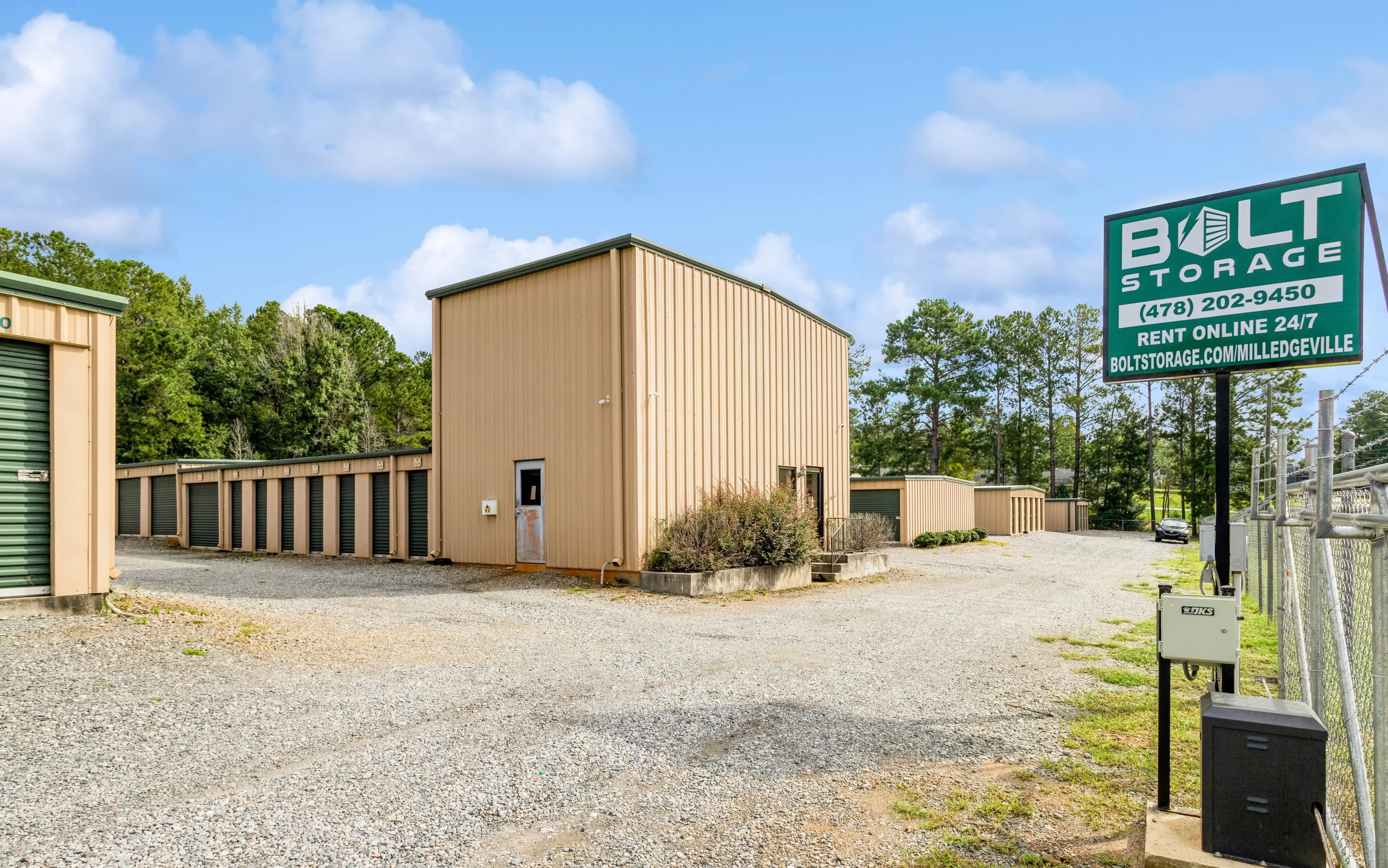 Front entrance and facility sign at our Milledgeville GA self storage location with drive up units