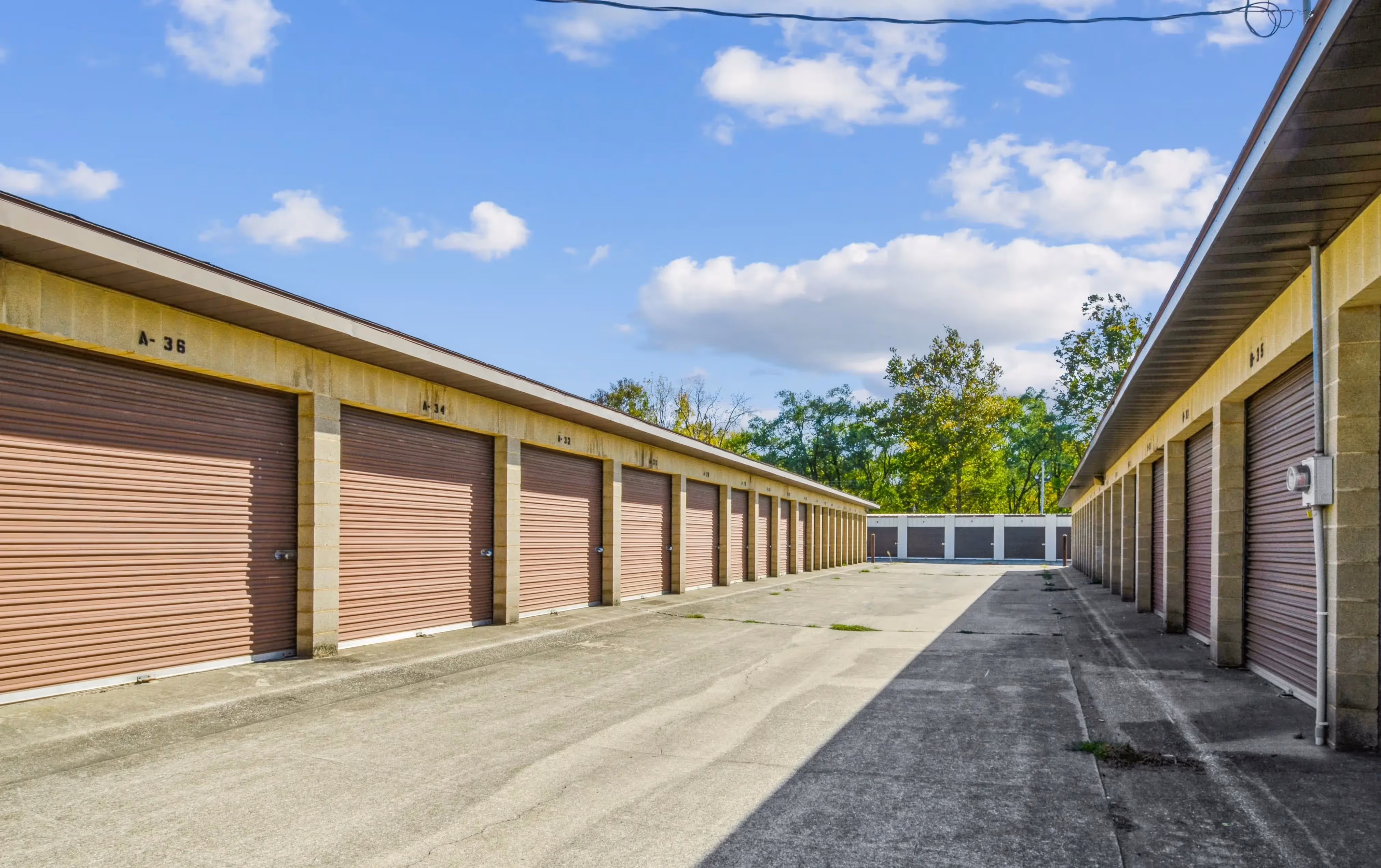 Two self storage buildings in Peru, IN with brown doors