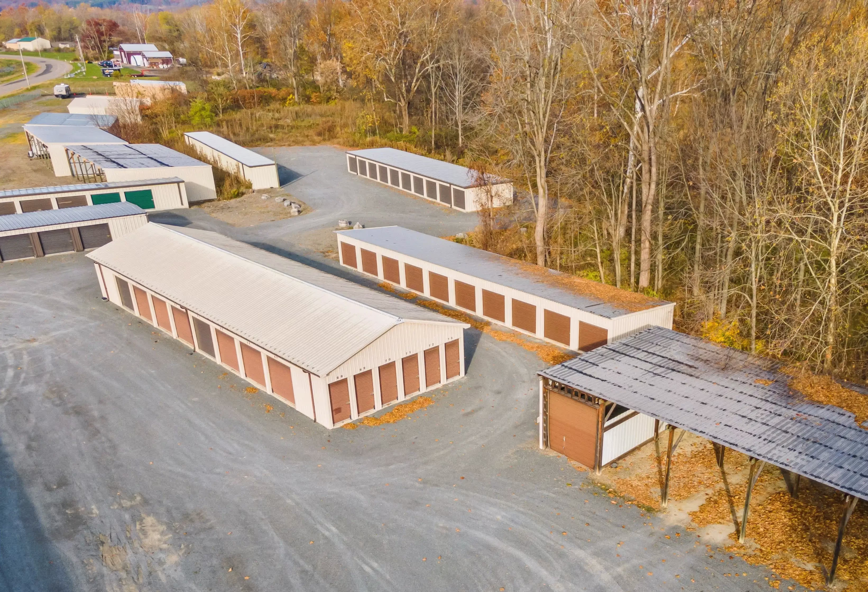 Aerial view of drive up storage buildings and covered RV parking at our Elmira NY facility