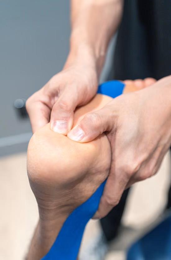 A person receiving a foot massage