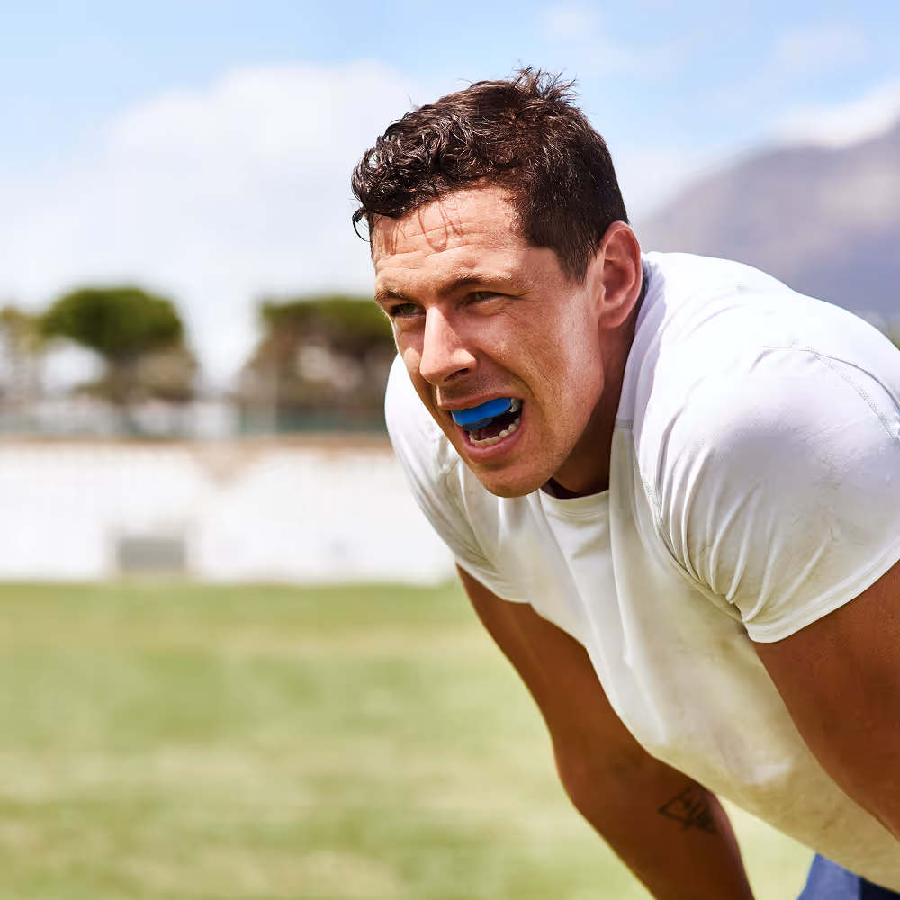 Benefits of athletic mouth guards in preventing tooth loss, fractures, and soft-tissue injuries during sports