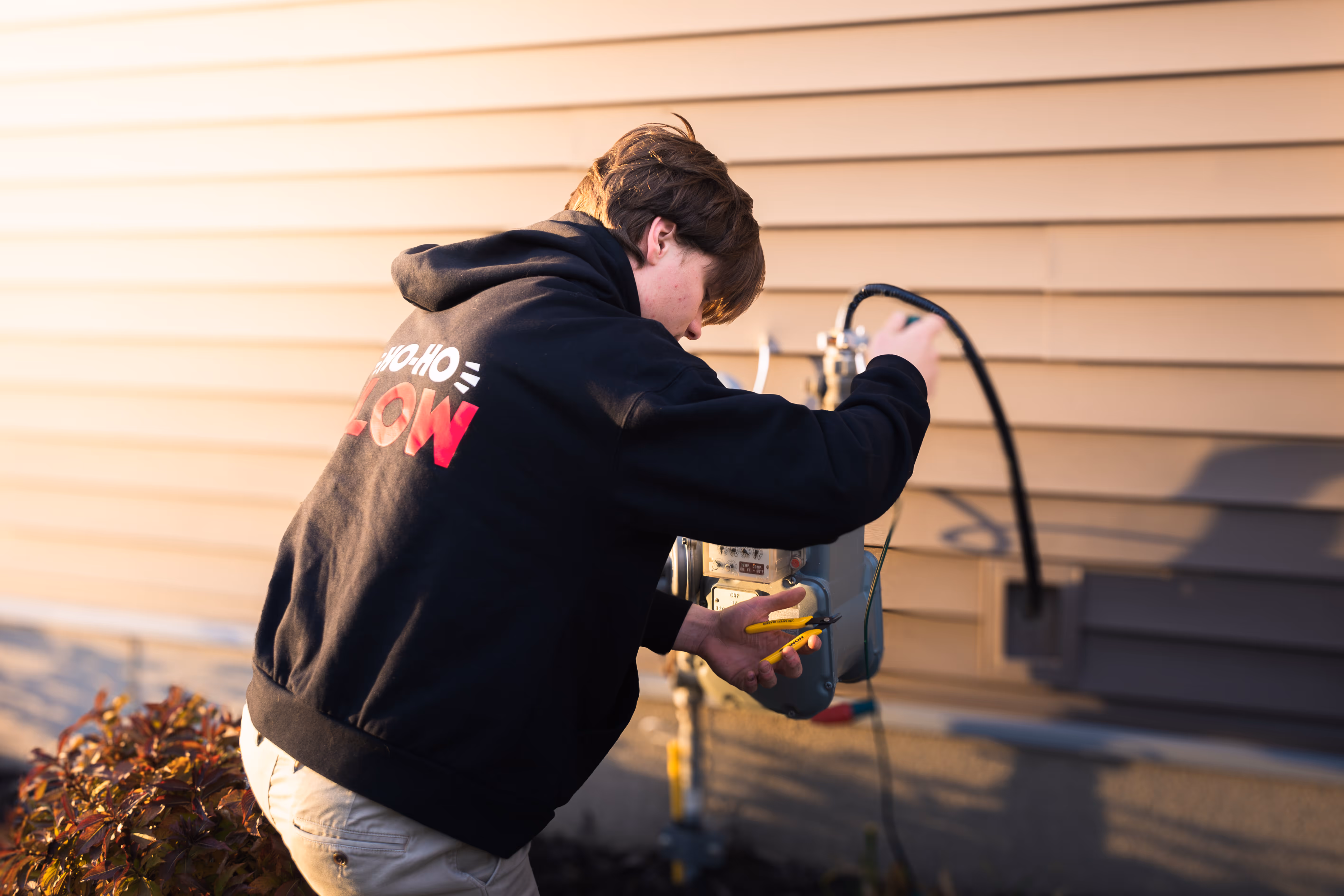Employee maintenance on Christmas lights.