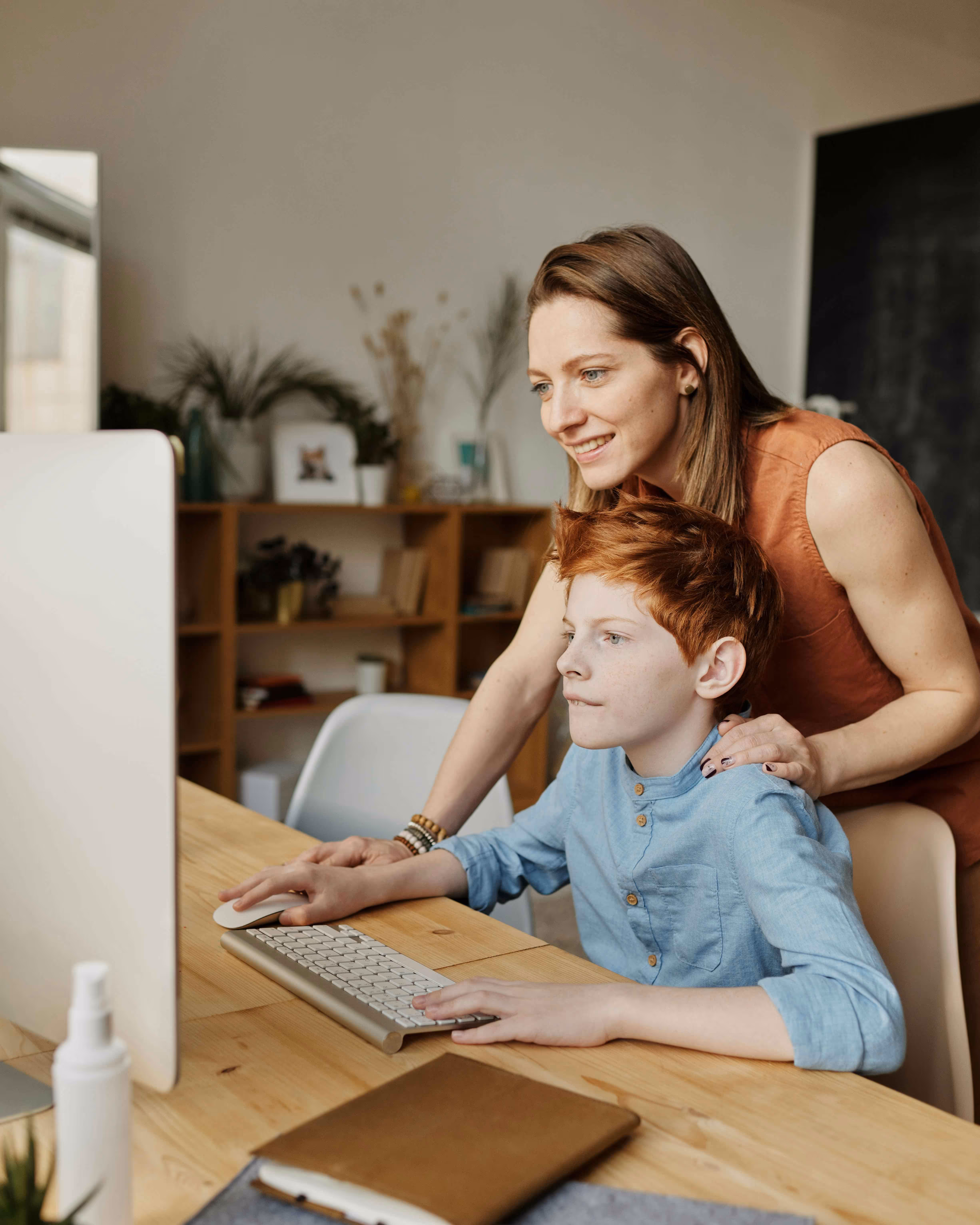 Mother using Digital Socrates with son to teach AI Literacy.