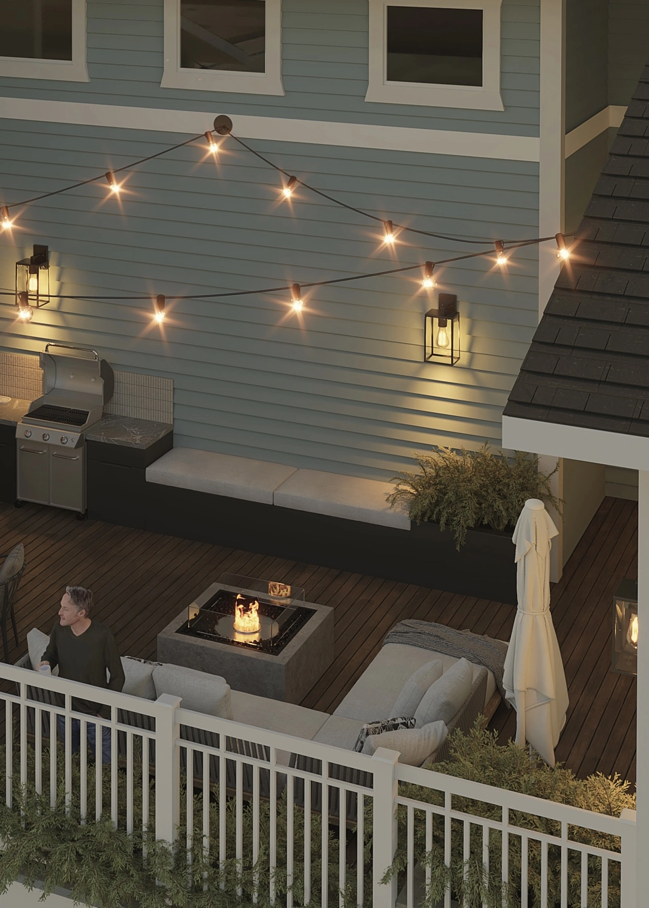 North Park Nook rooftop fire pit and lounge seating area with string lights at dusk