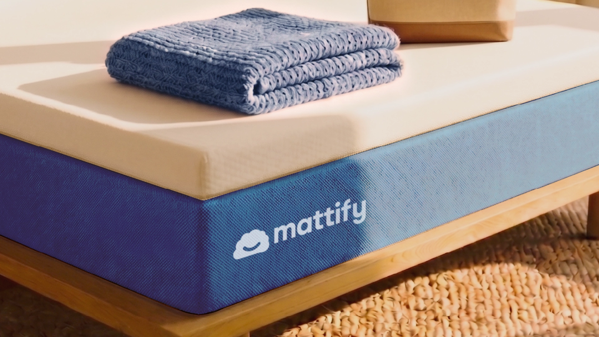 Het Mattify-logo op een matras.