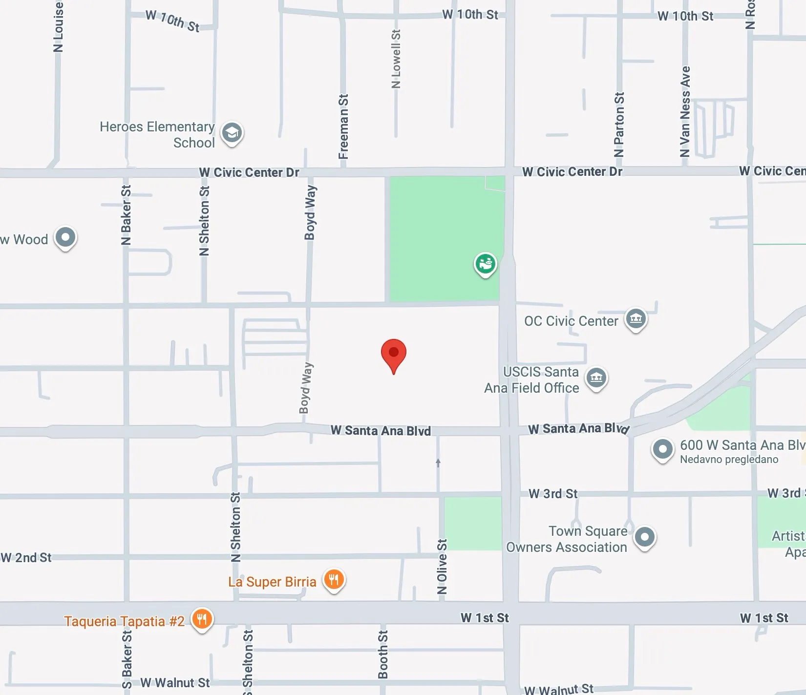 Map showing streets around W Santa Ana Blvd with markers for Heroes Elementary School, USCIS Santa Ana Field Office, OC Civic Center, La Super Birria, and Taqueria Tapatia #2.