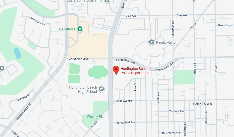 Map showing the location of Huntington Beach Police Department near Yorktown Ave and Main St, with nearby landmarks including Huntington Beach High School and LA Fitness.