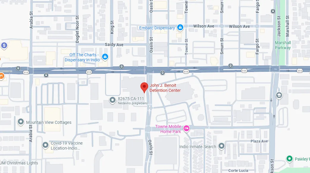 Map showing the location of John J. Benoit Detention Center near Oasis Street and Highway 111, Indio, with nearby points including Towne Mobile Home Park and Embarc Dispensary.