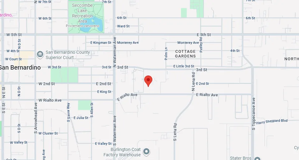 Map showing a red location pin near E Rialto Ave and N Lena Rd in a grid of streets with landmarks like San Bernardino County Superior Court and Seccombe Lake Recreation Area.