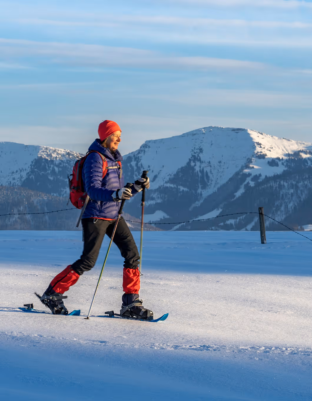 Schneeschuhwandern im Tannheimer Tal – Wintererlebnis in den Tiroler Alpen mit Sonne und Bergblick.