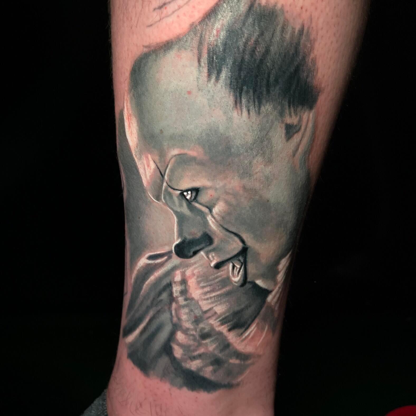 Black and grey tattoo portrait of It clown Pennywise..