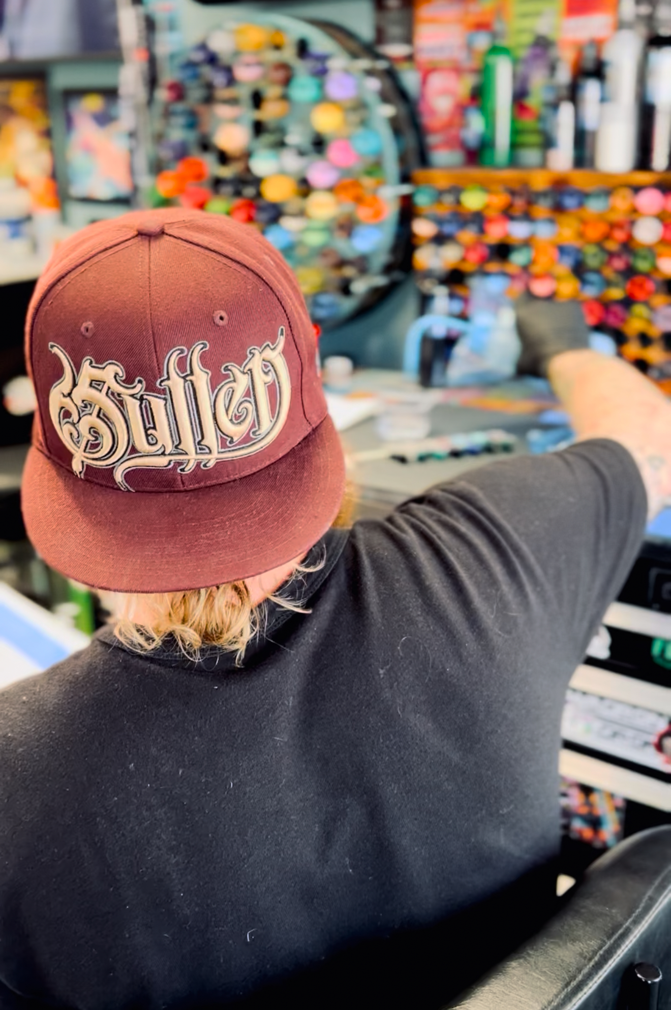 Caleb Lynch tattooing at Plus Ultra Tattoo Studio