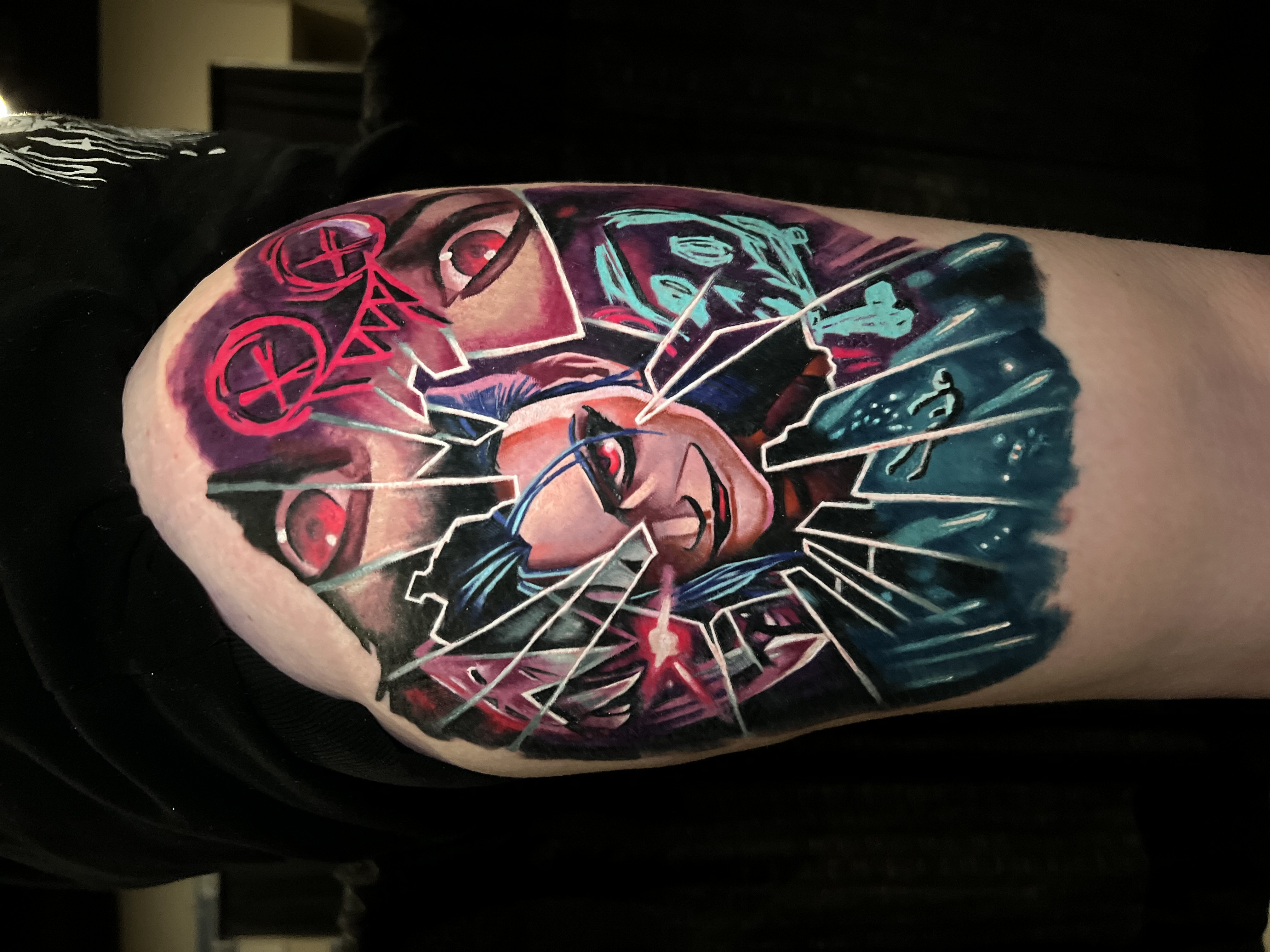 Colorful tattoo of a sinister anime character Jinx.