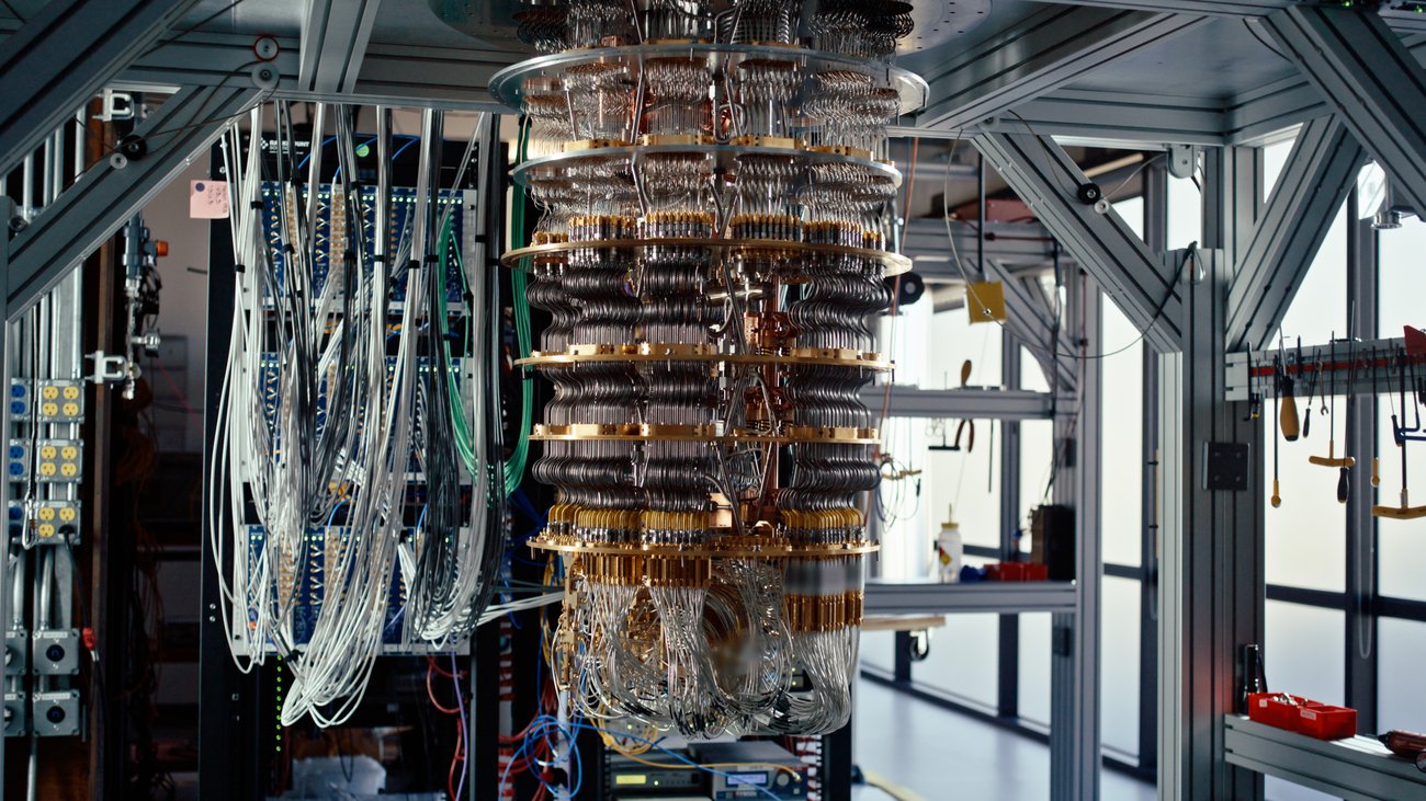Scientist adjust settings on a quantum computer platform