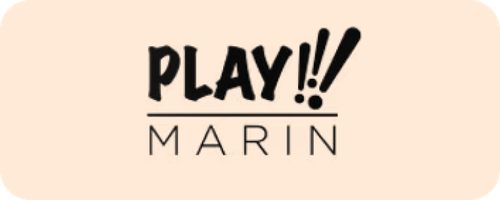Logo featuring the word PLAY!! in bold uppercase letters above the word MARIN in thin uppercase letters on a light peach background.