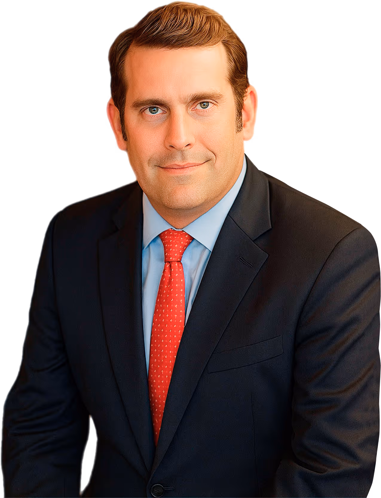 Man with light brown hair wearing a dark suit, light blue shirt, and red patterned tie, looking directly at the camera with a slight smile.