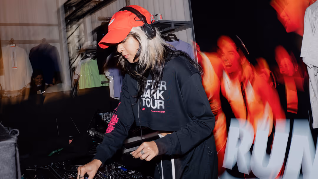A dj at a nike membership event