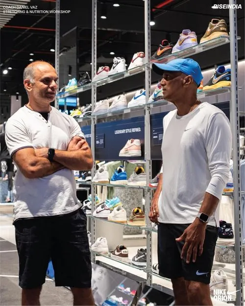 Dan Vaz talking with a fellow athlete