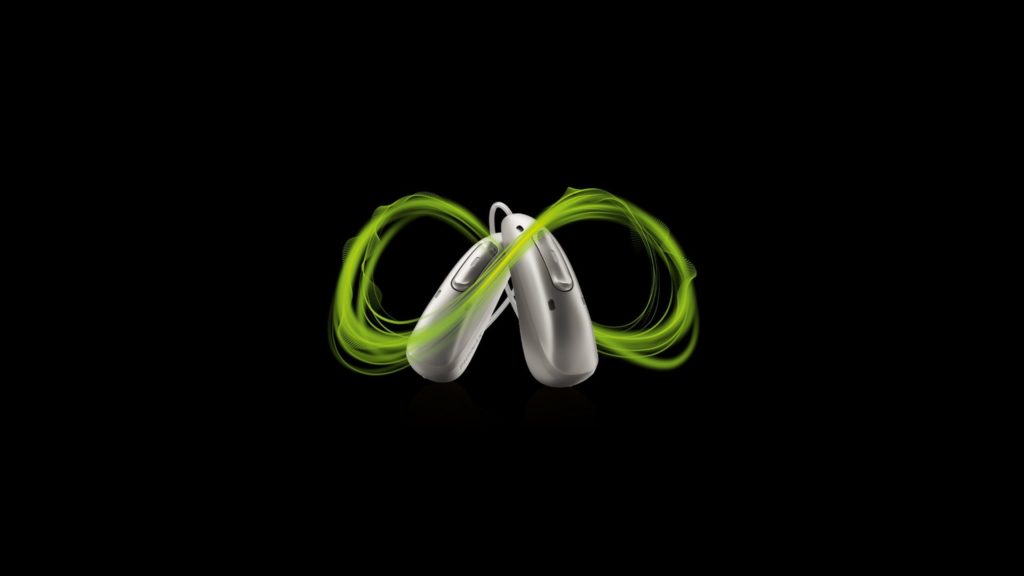 Phonak Audeo Infinio hearing aids with a green graphic infinity sign wrapping around them.