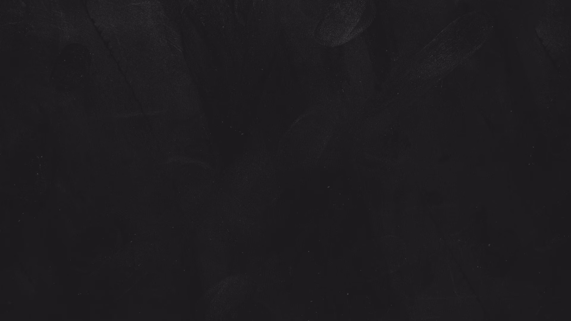 Fond noir avec des empreintes de mains grises presque invisibles dispersées.