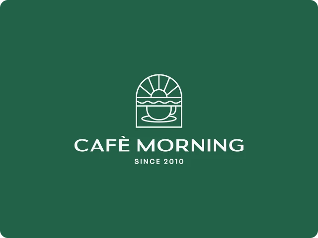 Logo of Café Morning featuring a coffee cup and saucer with a rising sun behind it, with text 'CAFÈ MORNING SINCE 2010' on green background.