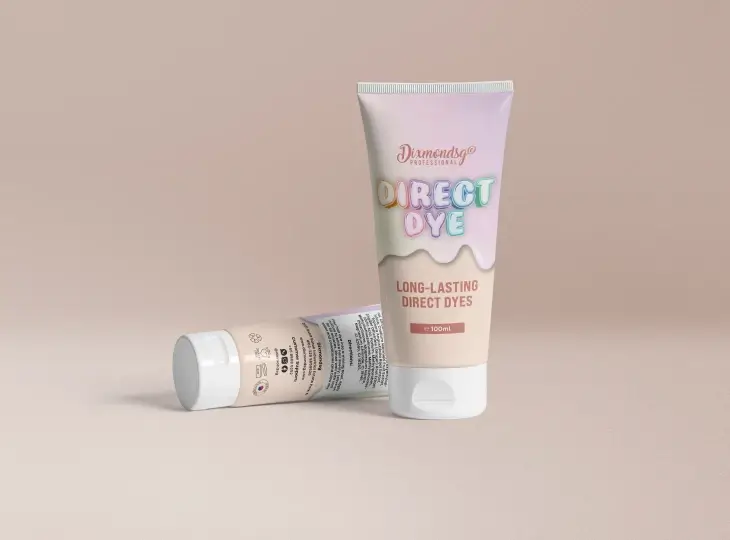 Tube of Dixonnds Professionals Direct Dye long-lasting direct dyes, 100ml, with one tube standing and one lying on a beige surface.
