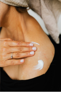 Applying Sunshine Miracle Cream – non-sticky, lightweight relief cream