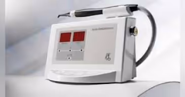 DIAGNOdent dental device with a probe and digital display on a white surface.