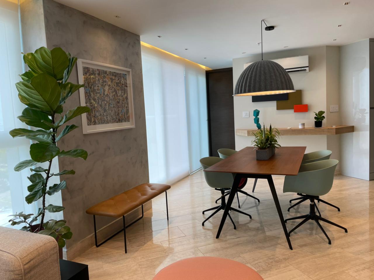 Contemporary living room with vibrant color accents in Costa del Este
