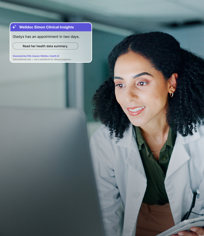 Clinician reviewing a Welldoc Simon Clinical Insights card reading "Gladys has an appointment in two days" before a visit