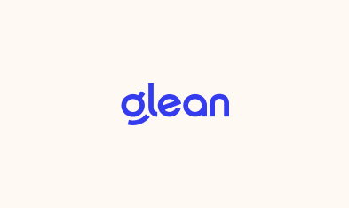 The word 'glean' written in lowercase bold blue letters on a light beige background.