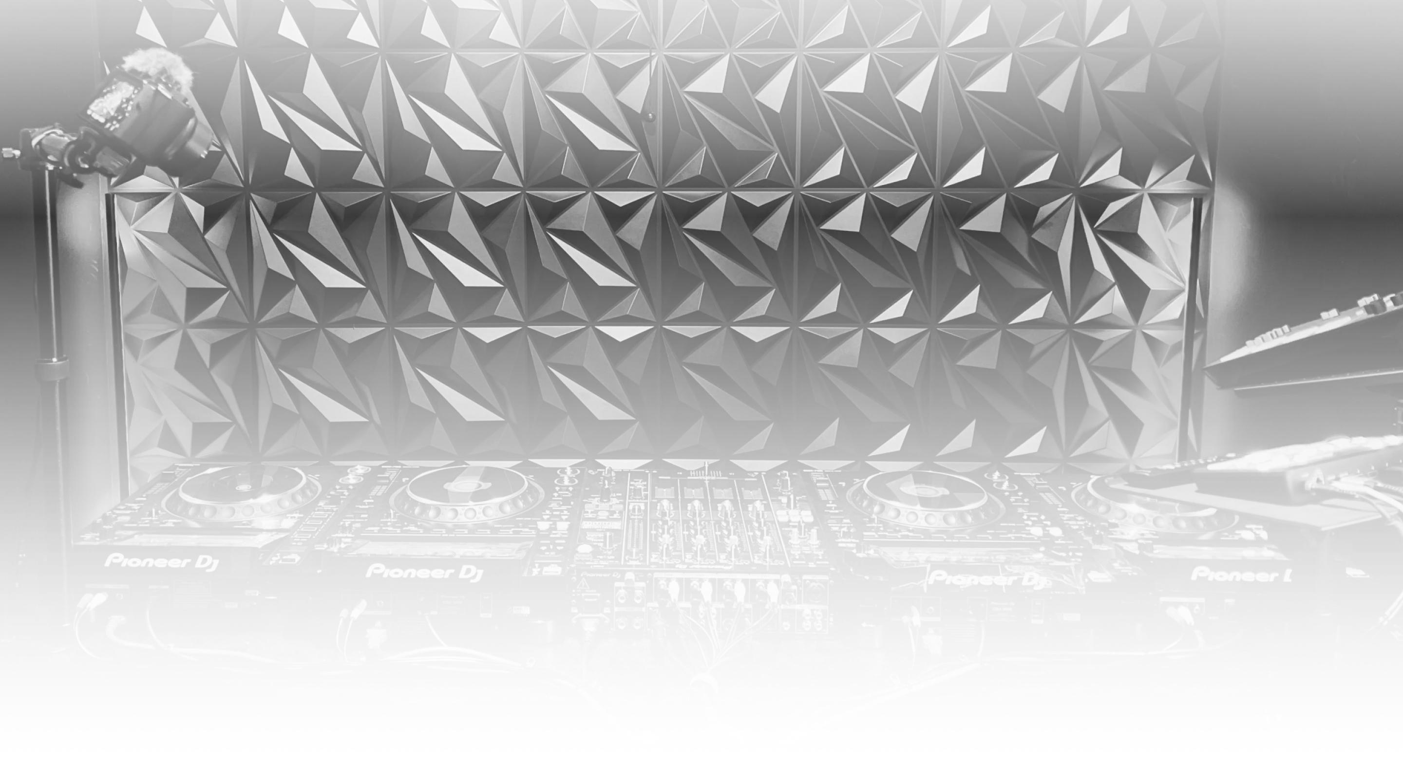 Black and white view of a professional DJ booth