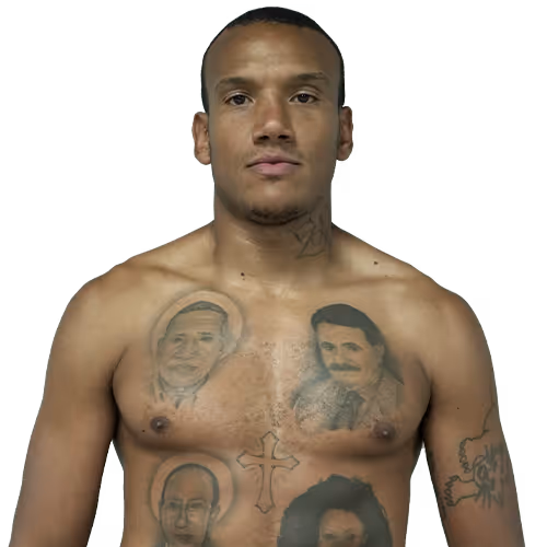 Shirtless man with four portrait tattoos on his chest and a cross tattoo in the center.