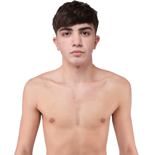 Young man with short dark hair looking forward, shirtless against a white background.