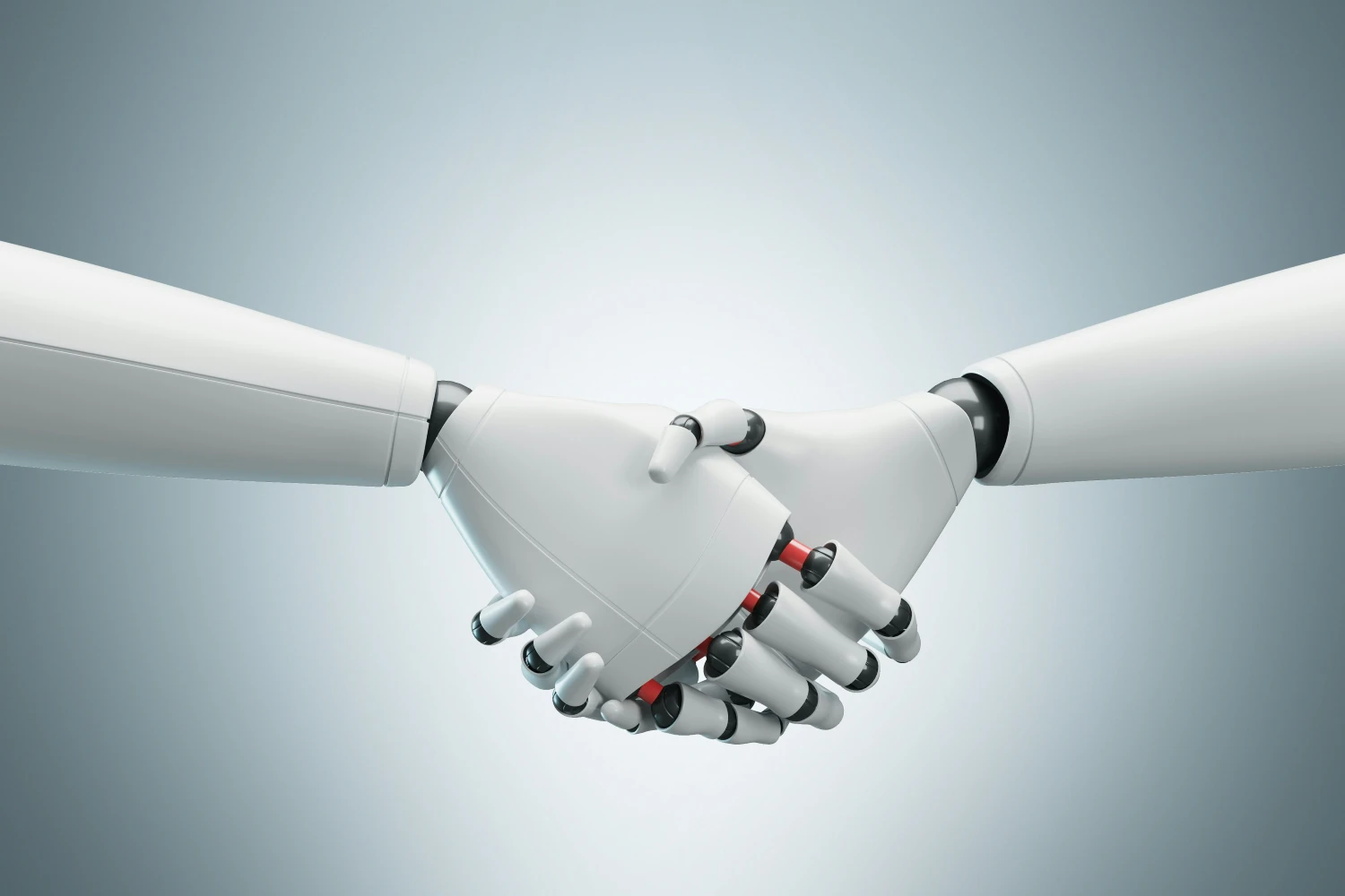 two robots shaking hands